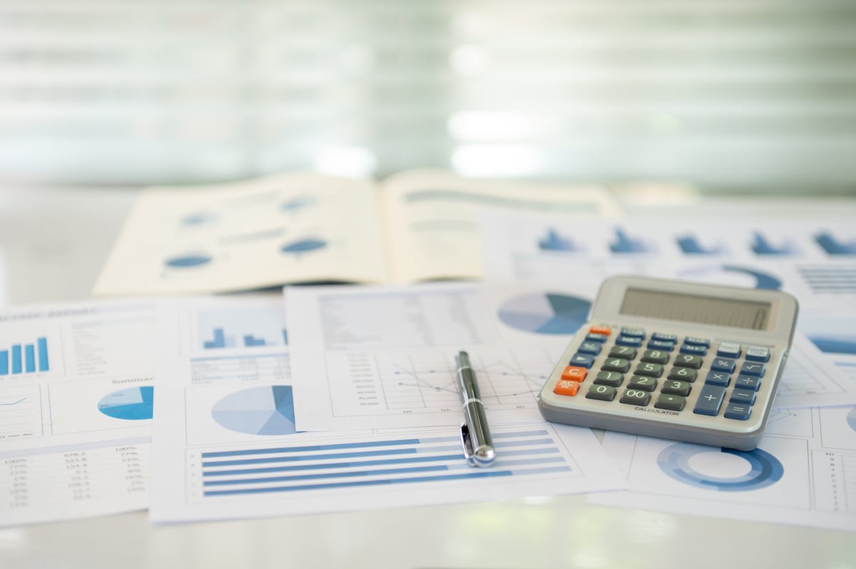 Executive financial review documents on a desk