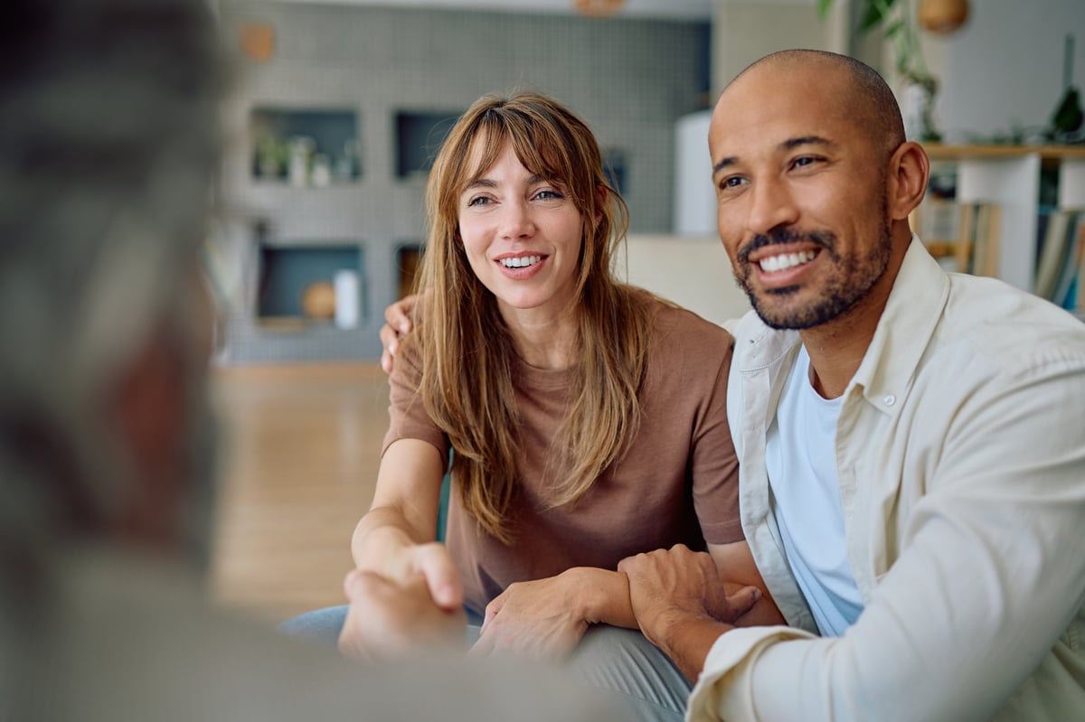Employee debt resolution consultation — advisor meeting with client to review financial wellness and resolution program options